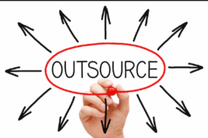 Why do companies choose to outsource work?